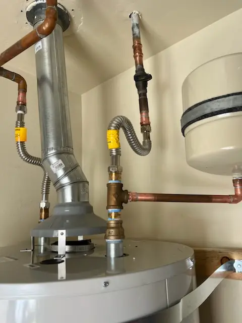 Water heater installation and plumbing repair in Woodland Creek Manor