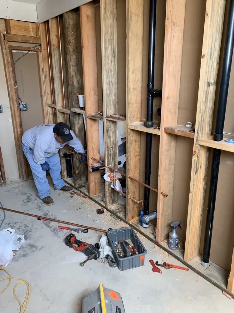 Commercial rough-in plumbing for Water Heater Replacement in Woodland Creek Manor